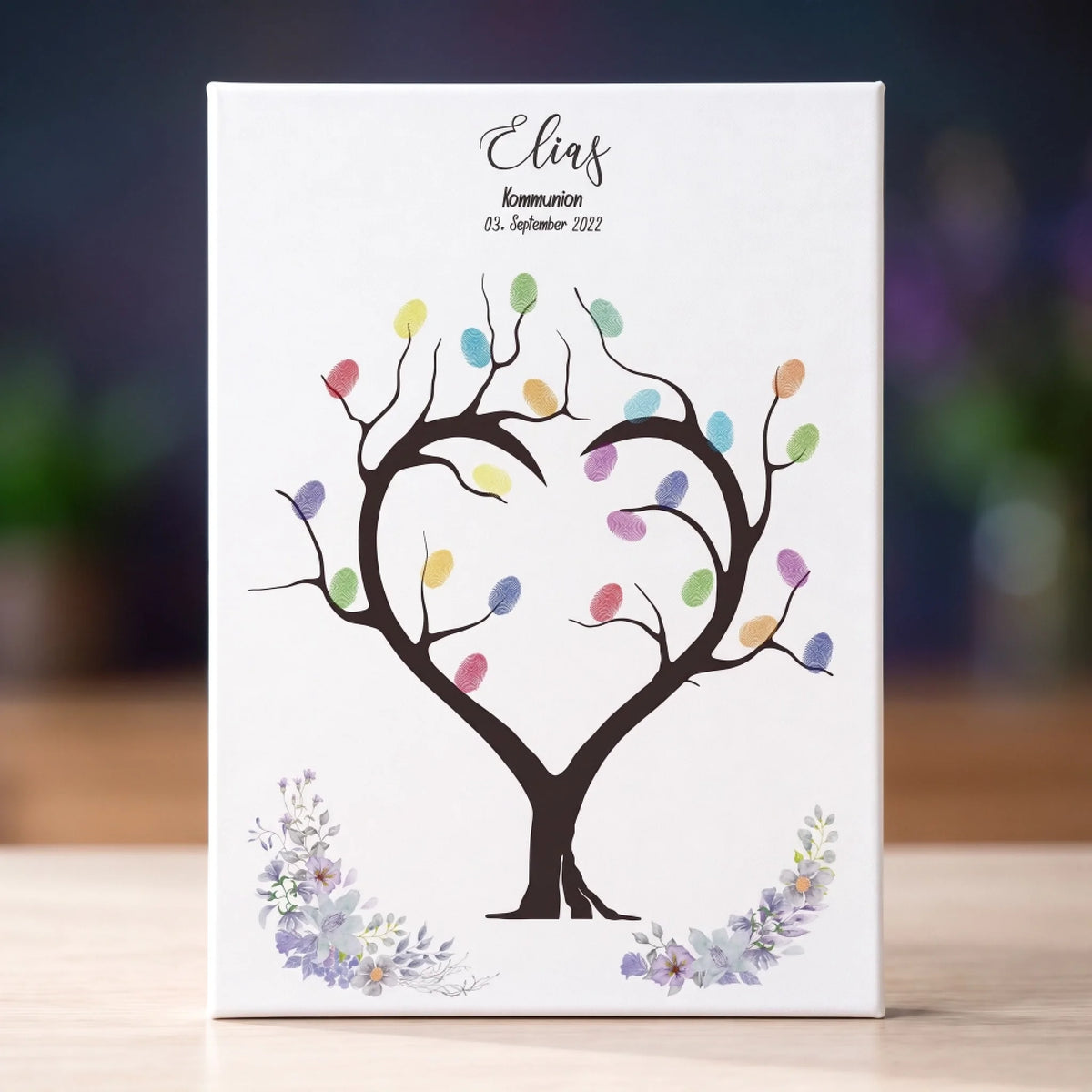 Weiße Leinwand als Gästebuch Kommunion mit Herzbaum, bunten Fingerabdrücken und floraler Verzierung, personalisiert mit Elias - Feed