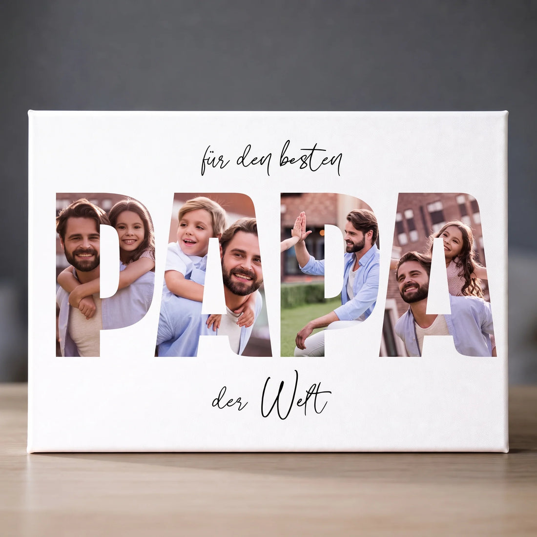 Weiße Leinwand mit Familienfotos in großen Buchstaben und der Aufschrift für den besten Papa der Welt
